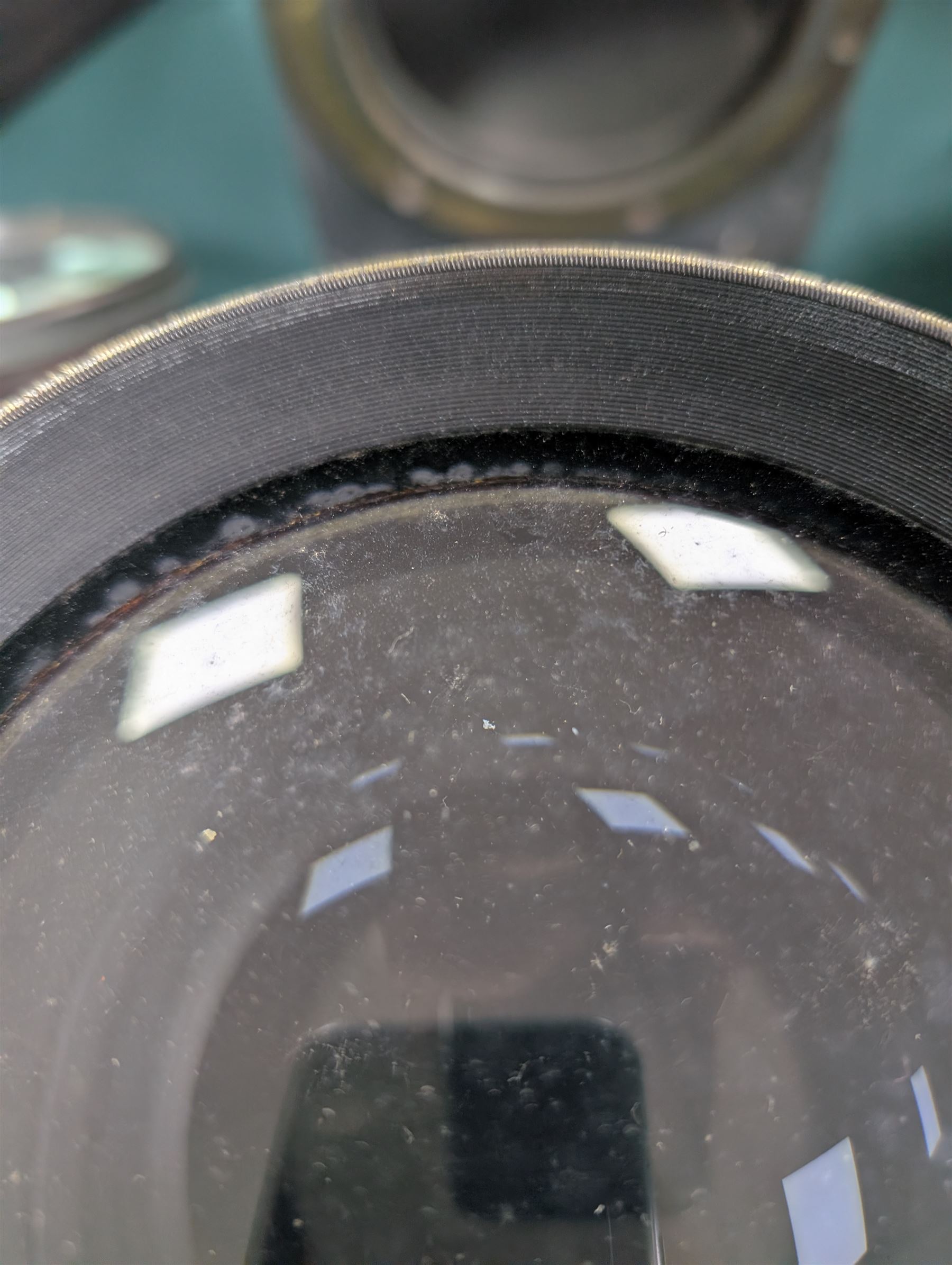 Late 19th century Voigtlander & Sohn large brass Euryscop lens no. 8 serial no. 31590, mounted to long black wooden box, with leather lens cover and seven brass Waterhouse stops, lens case D19cm