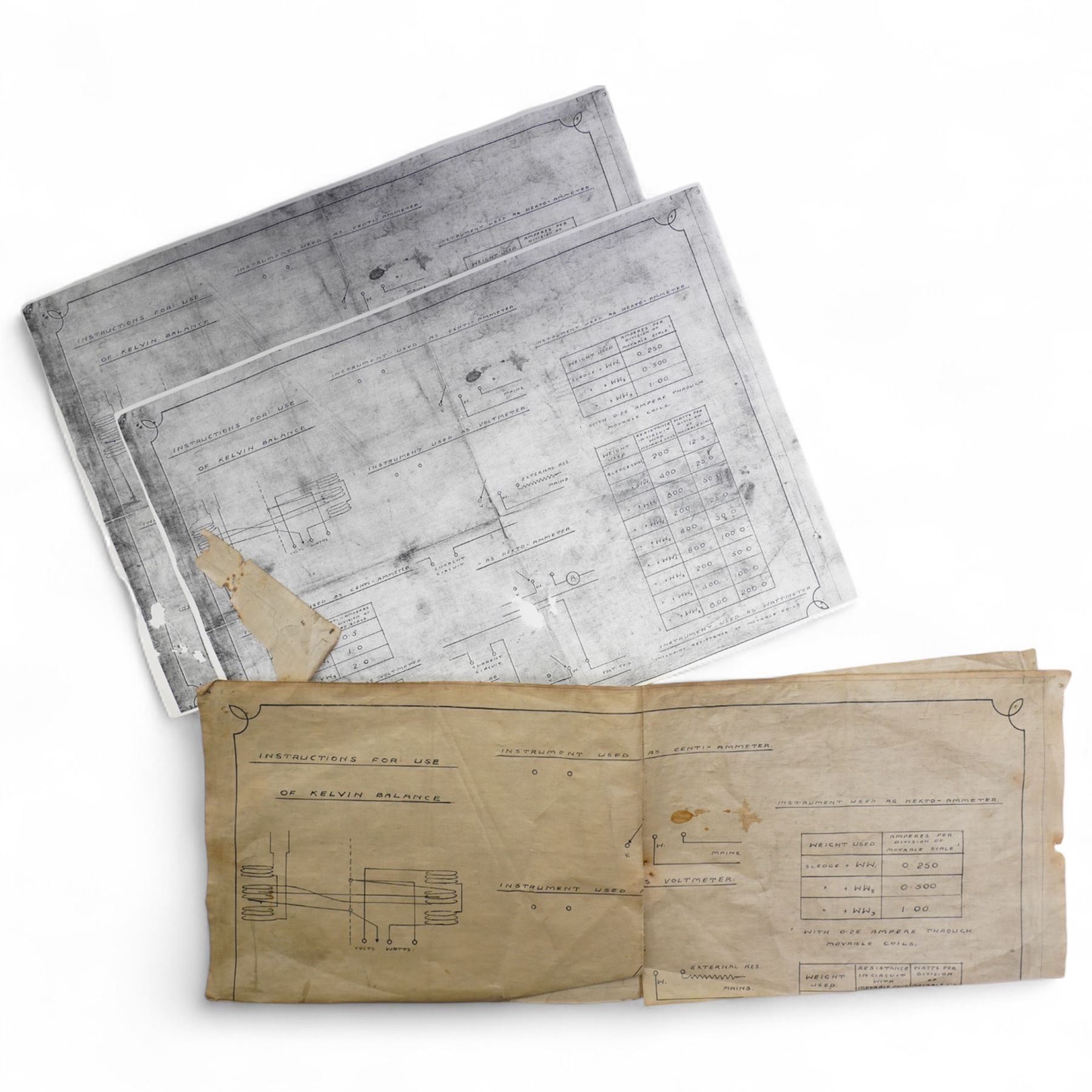 Lord Kelvins Patent electric current balance, no. 823, by Kelvin & James White Ltd Glasgow & London, with two pairs of horizontally mounted coils, suspended beam balance mounted on an ebonite base under glass and brass cover, with box of weights and accessories, raised on three wooden supports, W51cm H37.5cm