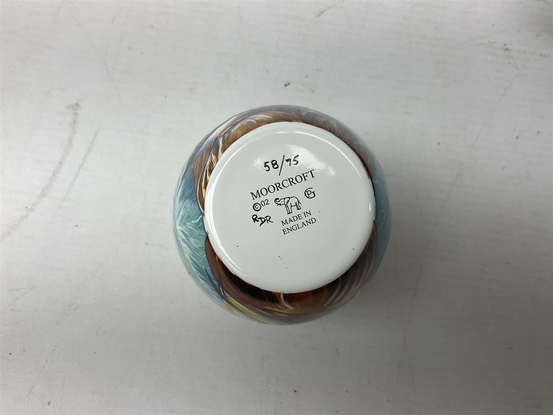 Limited edition Moorcroft enamel vase, decorated in the Lundy Island pattern, with certificate signed by the artists, no 58/75, in fitted box