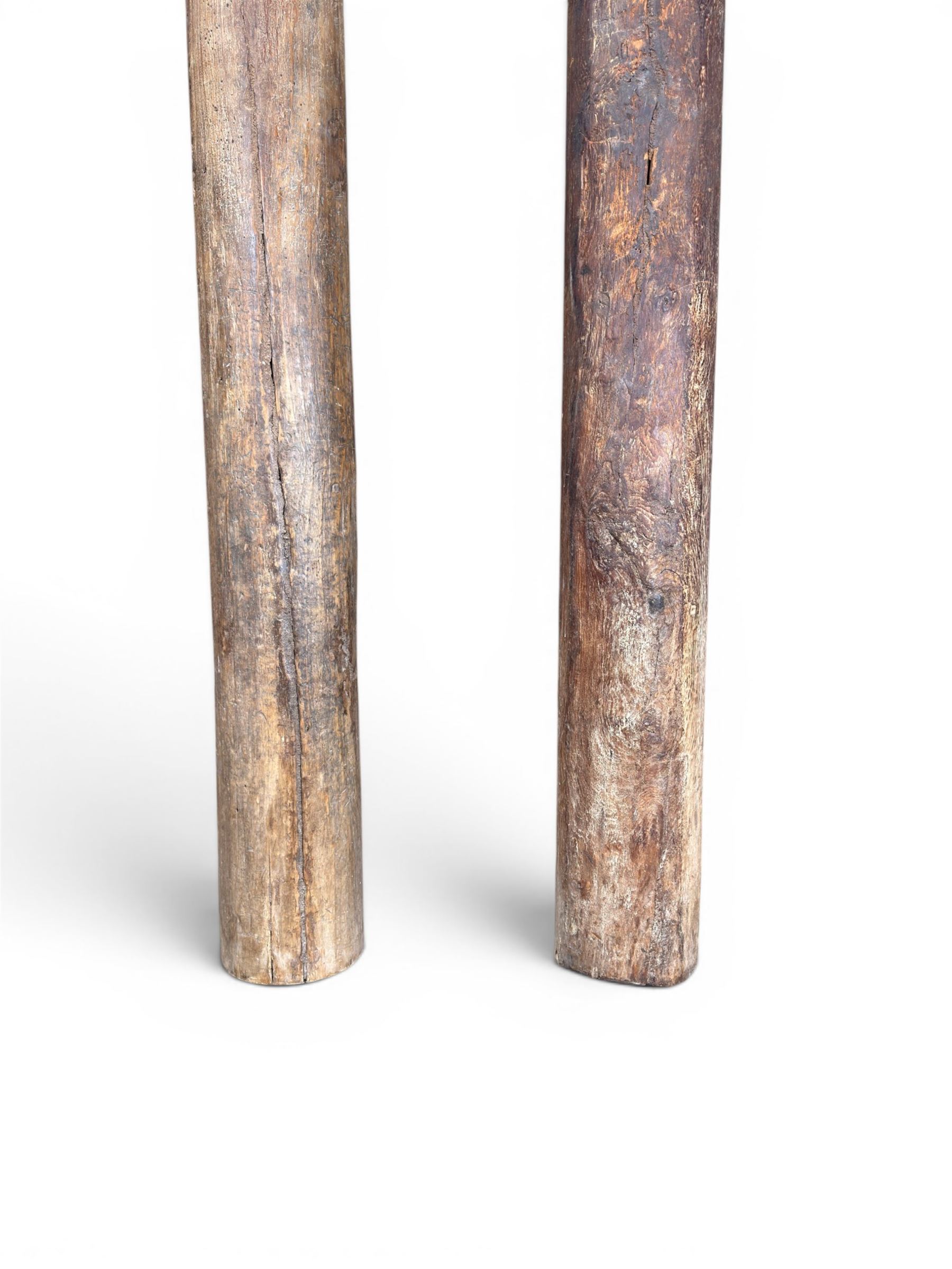 Matched pair of 19th century hardwood architectural columns with carved capitols, column diameter 18cm
