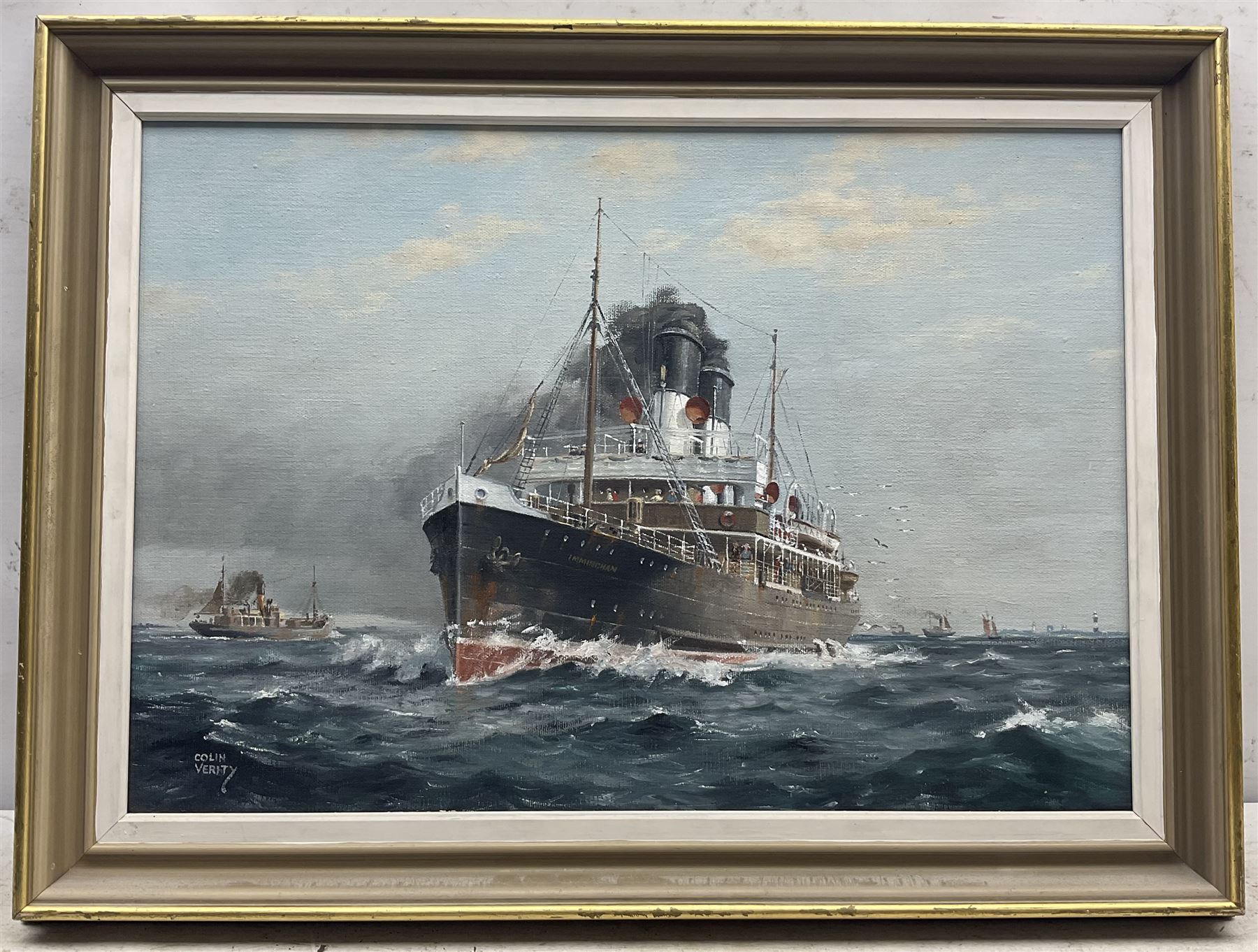 Colin Verity (British 1924-2011): 'Express Packet To Hamburg', the Great Central Railway Company steamer Immingham, oil on board signed, inscribed verso 34cm x 49cm 
Notes: Immingham, built by Swan Hunter of Wallsend and launched on 8th May 1906, was one of two 18 knot steamers commissioned by the GCR for the Grimsby-Rotterdam route, alongside Marylebone.
The ship's Parsons steam turbines were direct-drive units that proved uneconomic, and both vessels were soon rebuilt as single-screw steamships with the funnels of each reduced in number from two to one. She was requisitioned in 1915 by the Admiralty for Royal Navy use as a stores carrier and renamed HMS Immingham. She sank on 6th June 1915 after a collision with the boom defence vessel HMS Reindeer in the Mediterranean Sea, whereas Marylebone was maintained for another twenty years before being scrapped in 1938.