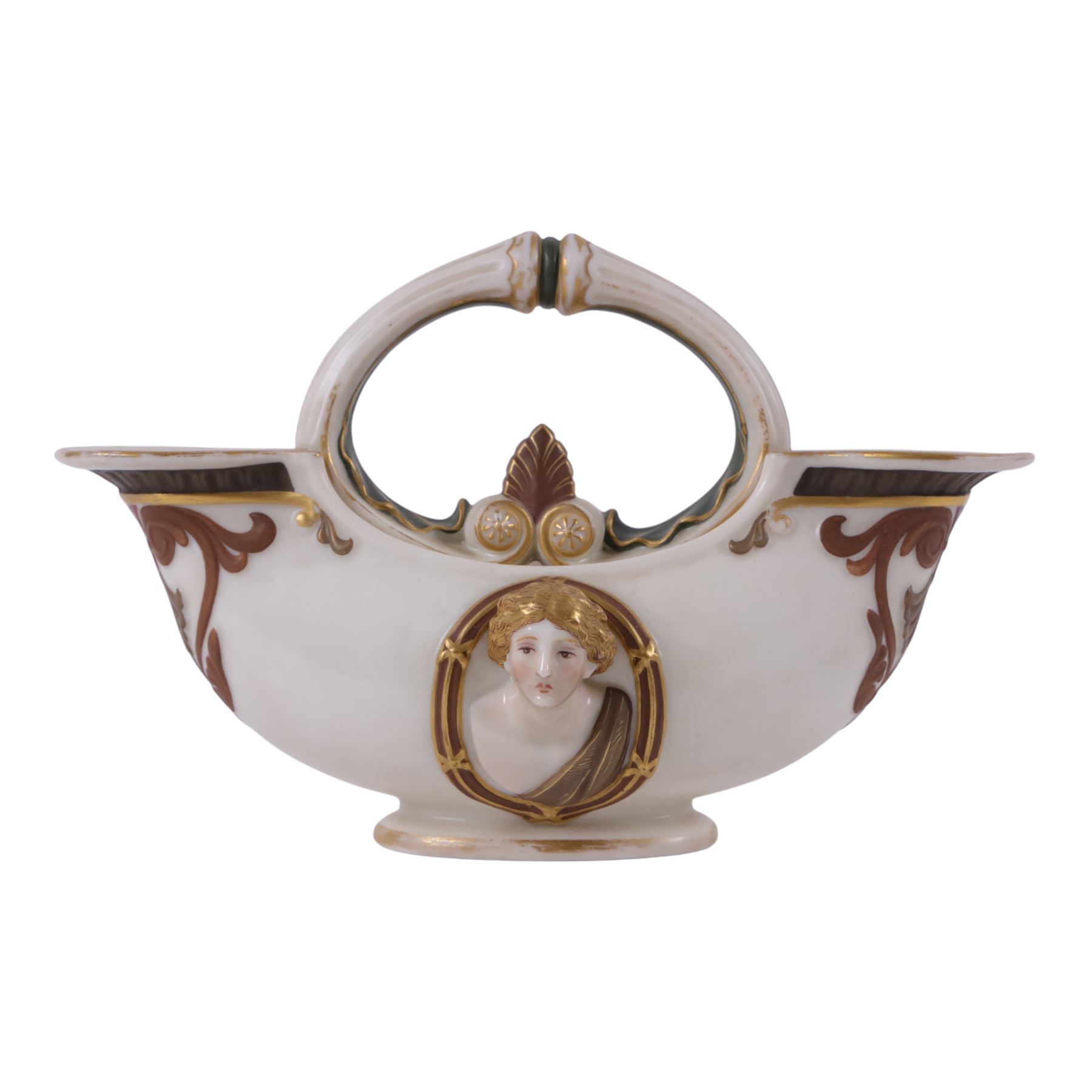 Royal Worcester double-ended vase, modelled in relief with mask panels in the classical dress the central handle with foliate and scroll work, H16cm 

