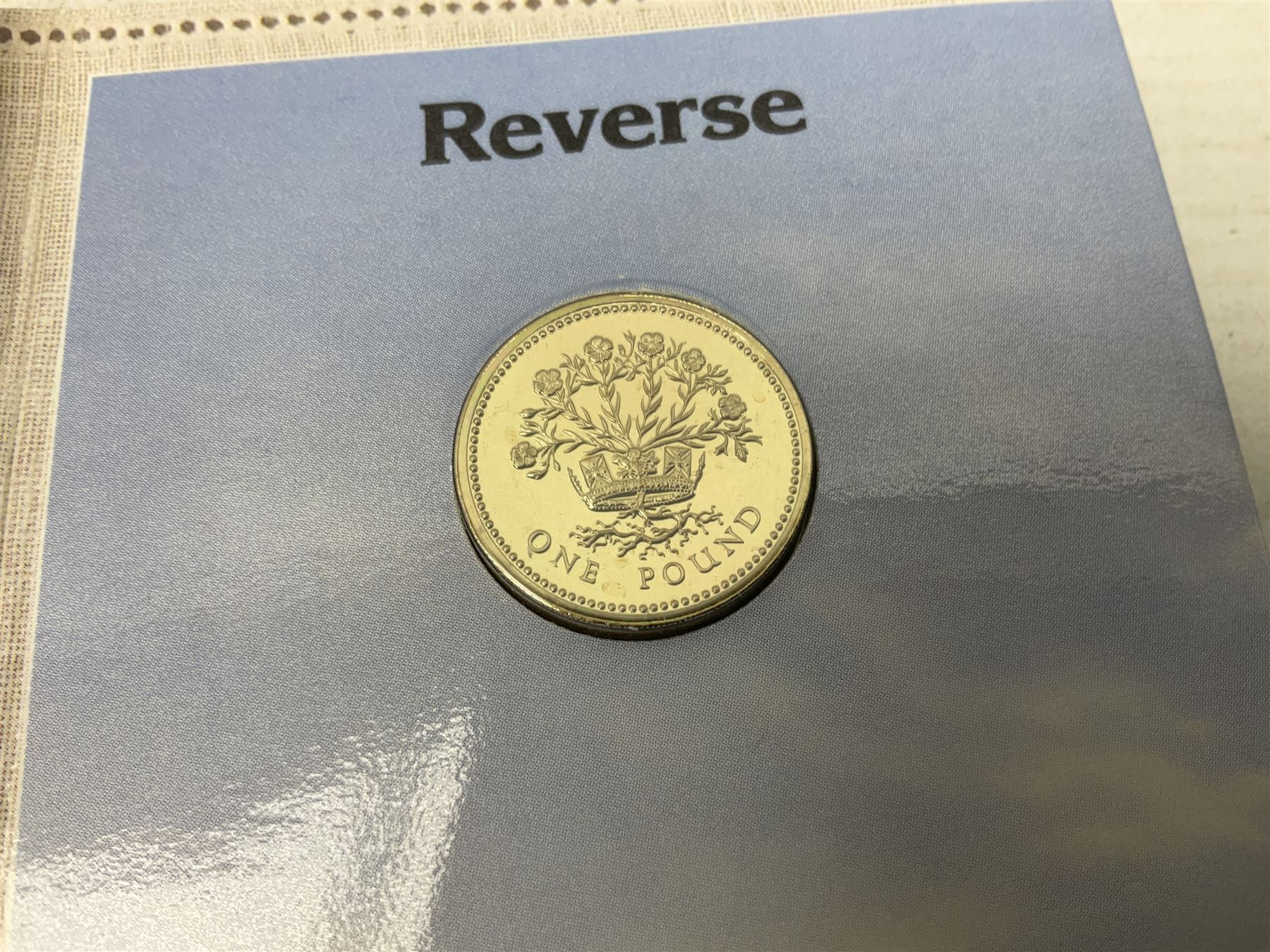 Two Great Britain and Northern Island proof sets dated 1970 and 1971, both with card cases, three 1986 Commonwealth Games commemorative two pound coins, in card folders, and six brilliant uncirculated one pound coins, in card folders