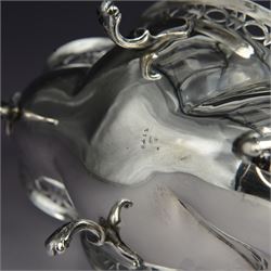 1920s silver basket, of navette form with pierced rim and lobed bowl, with fined pierced handle and upon four paw feet, hallmarked Sibray, Hall & Co Ltd, Sheffield 1923, including handle H18.5cm