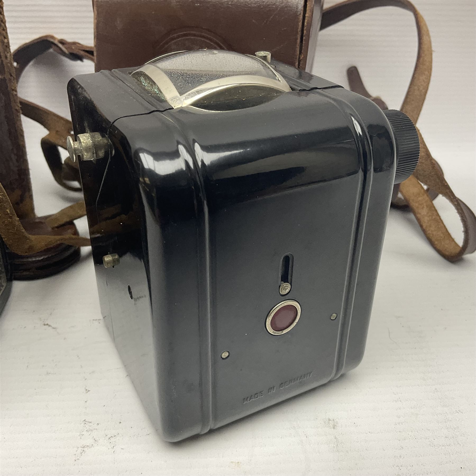 Franke & Heidecke Rolleicord twin lens camera, serial number 012706 with Heidoscop-Anastigmat f=7.5cm' lens and a 'Carl Zeiss Jena Triotar 1:4.5 f=7.5cm' lens, serial no 1474898, together with three similar cameras, including SEM TLR, serial no 420218, Ising Pucky box and Ferrania Elioflex, three in leather carry cases