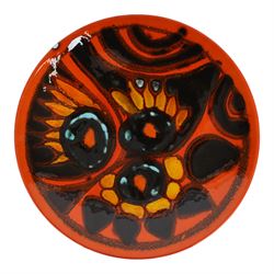 Poole pottery, Delphis Volcano pedestal dish, Delphis charges, in blues and black on a red ground, shape four and another plate, pedestal dish D23cm 