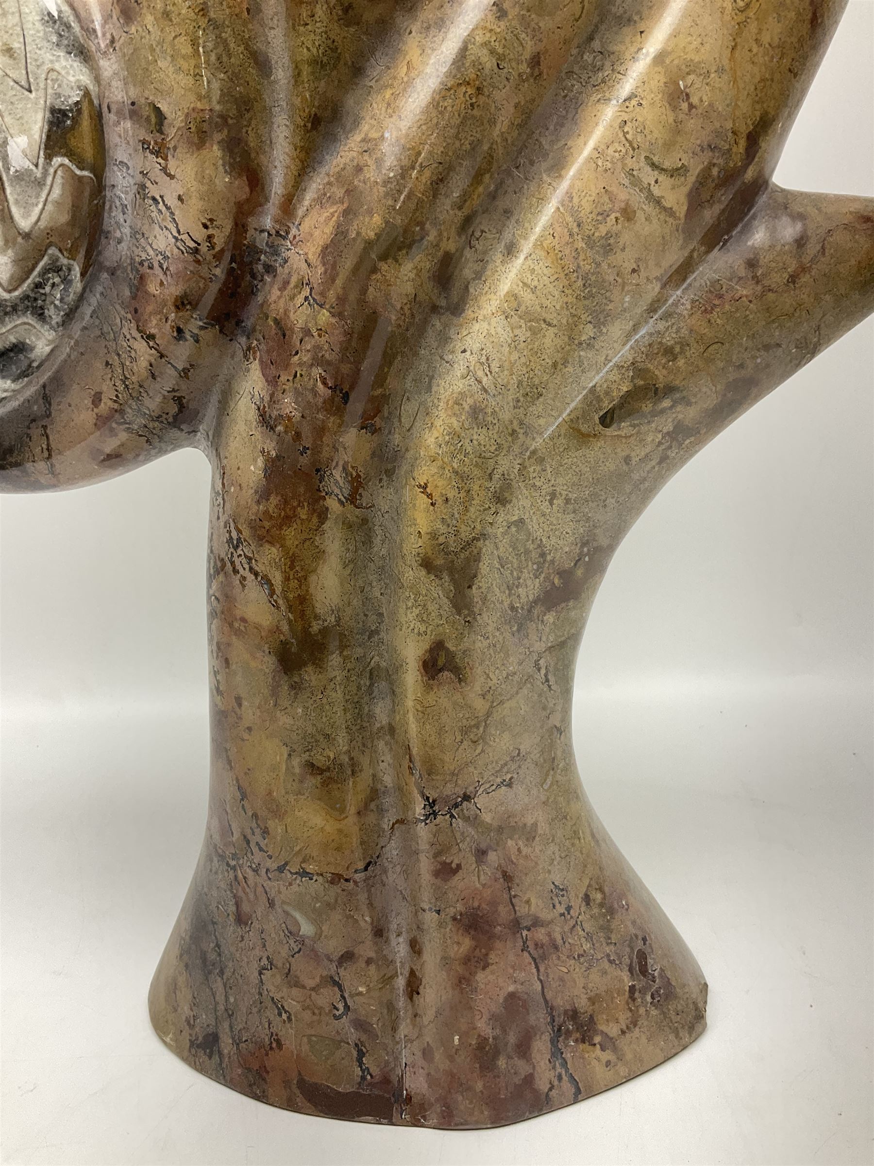 Goniatite sculpture, displaying two Goniatites within a polished and shaped matrix, age; Devonian period, H56cm