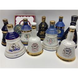 Bells, Scotch whisky, in seven Wade ceramic decanters, to include 50 year reign HM Queen Elizabeth II, Ninetieth Birthday of the Queen mother, 1991 year of the sheep, etc, together with two empty decanters and other items 