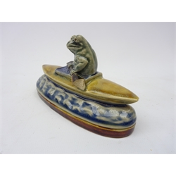  George Tinworth (British 1843-1913) for Doulton Lambeth, stoneware model of a Frog in a Canoe, impressed and incised marks, L12.5cm   