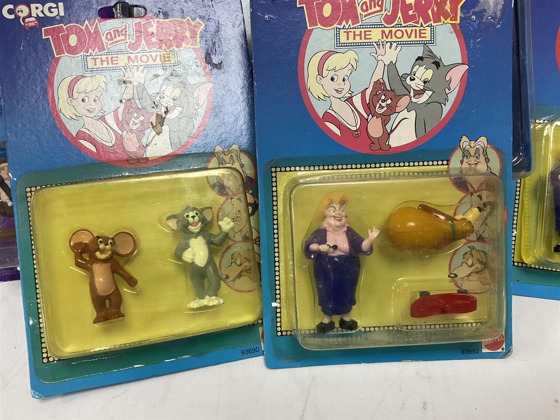 Fourteen carded action figures comprising Toy Story, X-Men Marvel Legends, Lord of the Rings, The Lost World Jurassic Park (2), The Secret Saturdays, Wallace & Gromit, Corgi Tom & Jerry (4), Flintstones, Lost in Space and Disney Infinity Cars; all in unopened blister packs; together with two boxed Robocop figures and carded James Bond car (17)