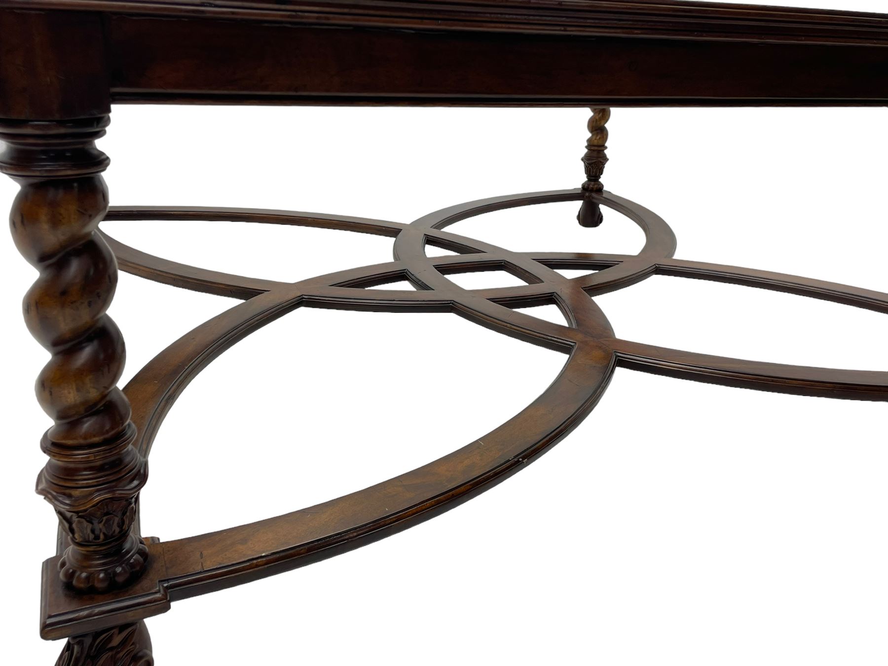 Jonathan Charles - large mahogany coffee table, the square oyster veneered top with verre églomisé inset, the glass hand-painted with gilt scrolling foliate patterns, raised on spiral turned supports with acanthus and gadroon carvings, united by interlocking demi-lune stretchers, on scrolled acanthus feet