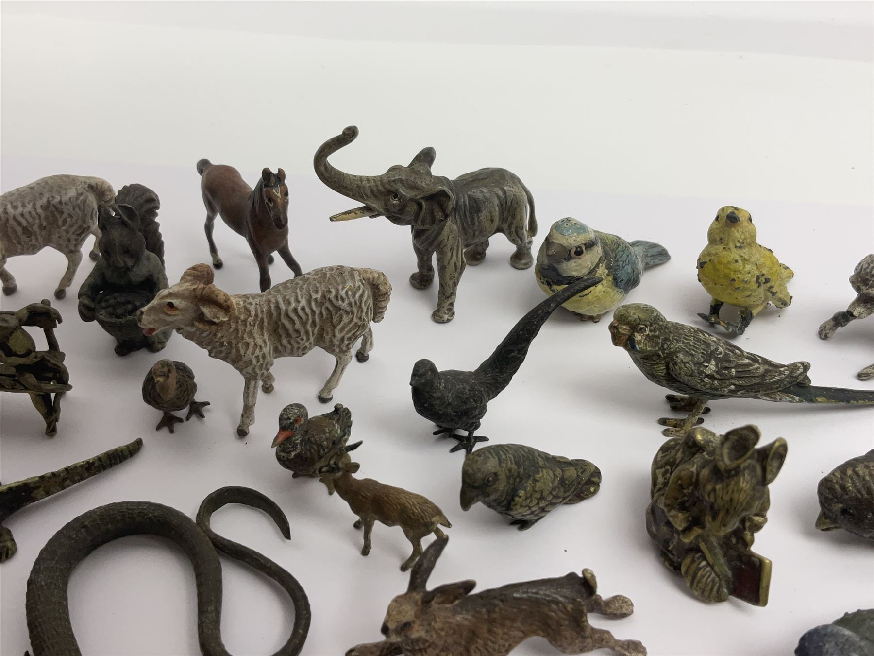 Collection of miniature cold painted bronze and similar animals, to include birds, sheep, horses etc 
