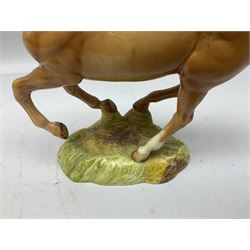 Beswick figure of cantering Palomino horse on base model no 1374, with impressed and printed mark beneath, H18cm