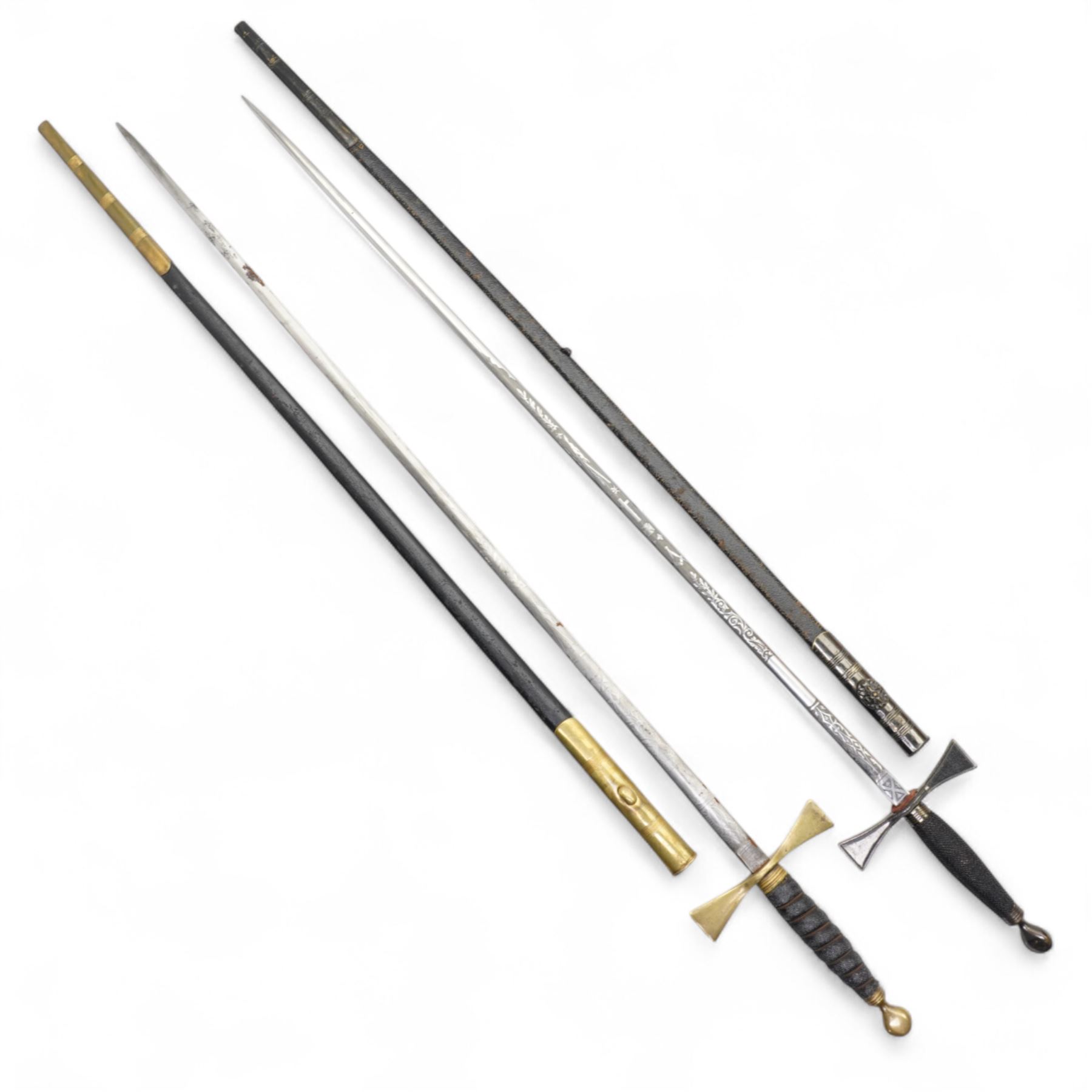 Masonic ceremonial sword with engraved blade, wire wound grip and scabbard and another similar (2)