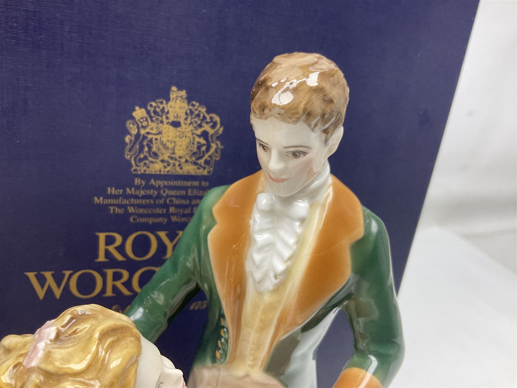 Two Royal Worcester figures, comprising A Gift of Love from the Age of Romance Series, limited edition 325/500, with certificate and original box and Royal Premier from the Glittering Occasions series, with original box 