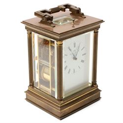 Matthew Norman - Modern repeating carriage clock with Swiss movement, white dial, brass and bevelled glass case H14cm, boxed and a miniature carriage clock by the same maker H9cm, boxed (2) 