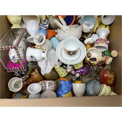 Large collection of egg cups, together with teacups, saucers and other collectables in four boxes 