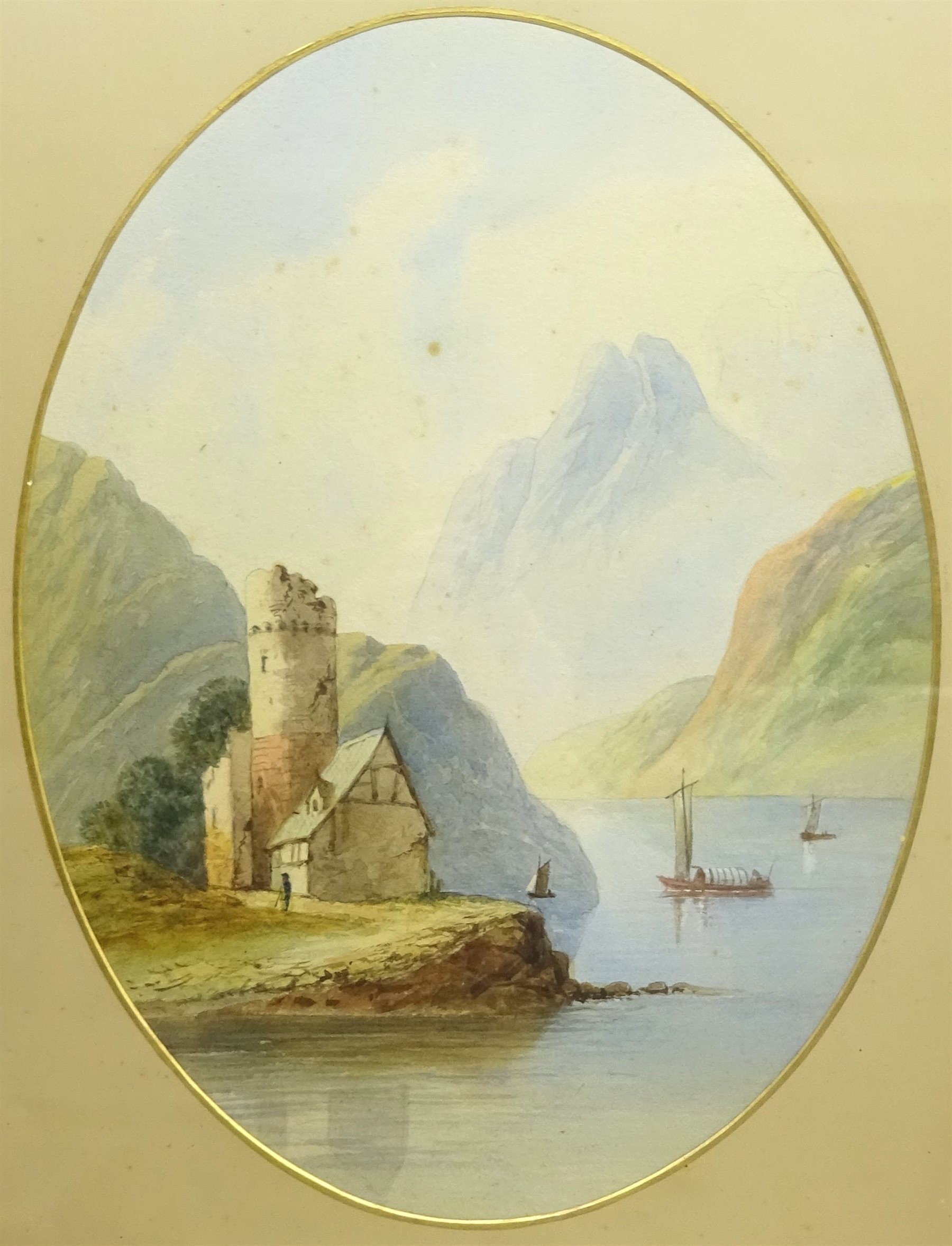 English School (19th century): Mountain lake scene, oval watercolour unsigned 39cm x 29cm in period oak frame