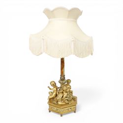 Second Empire style gilt metal table lamp, the hexagonal plinth base with applied foliate ...