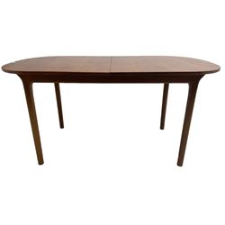 AH McIntosh & Co of Kirkaldy - mid-20th century teak extending dining table, rectangular top with rounded corners, concealed integrated double leaf, raised on tapered supports, 'Furniture by McIntosh sticker to underside of leaf