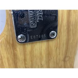 Ernie Ball Music Man Sting Ray 4 string bass guitar, in natural finish with roasted maple neck and tortoiseshell effect scratch guard, serial no 87485, in black Music Man hard case, guitar L114cm