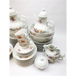 JLmenau German tea and dinner wares, comprising twelve dinner plates, seventeen side plates, twelve bowls, four large serving bowls, pair of oval serving platters, pair of smaller examples, two coffee pots, eleven teacups, twelve saucers, two milk jugs, two larger jugs, and two lidded sucriers. 