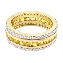 Gold yellow sapphire and diamond three row full eternity ring, channel set calibre cut sapphires, with a row of round brilliant cut diamonds set either side, stamped 9K, total sapphire weight approx 2.95 carat, total diamond weight 0.85 carat
