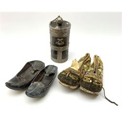 Pair of early 20th century silk embroidered shoes, L17cm, two Oriental leather slippers and an early 20th century cylindrical wooden vessel with metal mounts (5)