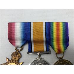 WW1 KIA group of three medals comprising British War Medal, 1914-15 Star and Victory Medal awarded to 9069 Cpl. J. Mayhew Glouc. R.; with ribbons; displayed on modern bar, and photograph of recipient in uniform; some biographical details