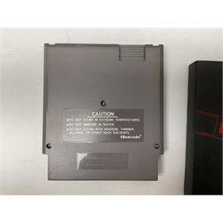 Nintendo Entertainment System (1985) console with two controllers, accessories and instruction booklet. NES Games ‘Duck Hunt’ with Nintendo Zapper gun, ‘Pinball’ and ‘Super Mario Bros.’, all with original sleeves and instruction booklets. NES game ‘Super Mario Bros. 2’ cartridge only