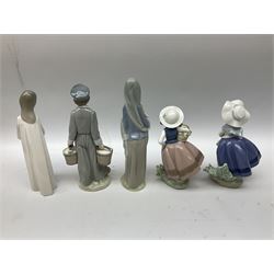 Collection of six Lladro figures, to include Sweet Scent, model no. 5221, Pretty Picking model no. 5222, Dutch Boy with Milk Pails model no. 4811, Lladro Seesaw figure group, modelled as a young boy and girl playing on a seesaw beside a puppy, model no. 1255, with printed mark beneath, L23cm (a/f) and two others