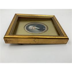 English School (18th century)
Portrait miniature upon ceramic plaque 
Head and shoulder portrait of a gentleman in blue coat and white turban, holding book under one arm
Indistinct inscription verso
Within gilt mount and gilt frame under glass
Portrait 7cm x 5.5cm 
Plaque 14cm x 11.5cm
Frame 16cm x 13.5cm
