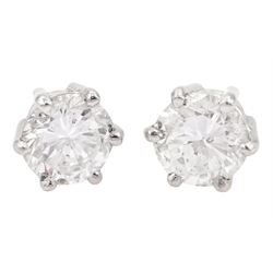 Pair of 18ct white gold round brilliant cut diamond stud earrings, total diamond weight approx 1.30 carat