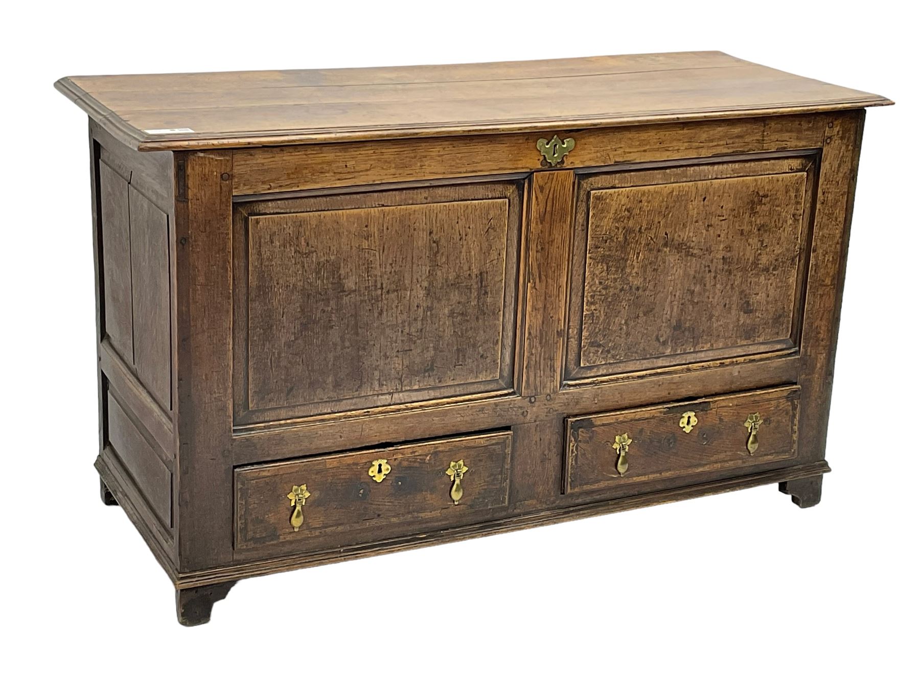18th century oak mule chest, moulded hinged lid over panelled front, fitted with two moulded drawers
