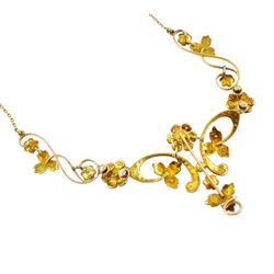 Edwardian gold split pearl flower head and foliate necklace, stamped 15ct