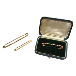  Gold twist bar brooch stamped and two other gold bar brooches, stamped 9ct or tested 9ct, approx 8.96gm  