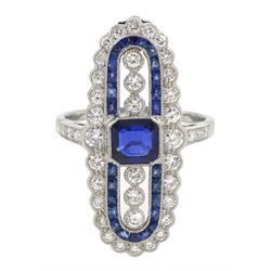 Platinum sapphire and diamond oval panel ring, with diamond set shoulders, total diamond weight approx 0.85 carat