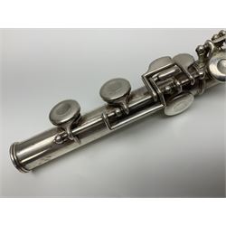 Boosey & Hawkes London Regent three-piece flute, serial no.345447; in B&H Bandhite hard carrying case; and Deg Music Company Inc. USA Claudel Model three-piece flute, serial no.491718, in hard carrying case (2)