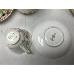 Royal Doulton Apple Blossom pattern tea service for twelve, comprising twelve saucers, twelve tea plates, twelve teacups, milk jug, sucrier and two cake plates