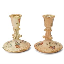 Collection of Worcester blush ivory, including a pot pourri and a pair of candlesticks by George Grainger & Co, with brown and green stamps to bases, together with a teacup and saucer with marks in puce, candlesticks H12cm 