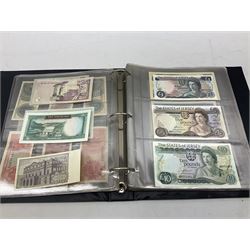 World banknotes, including Queen Elizabeth II The States of Jersey one pound 'DB202703', five pounds 'BB527762' and ten pounds 'AB651481', reserve bank of New Zealand two dollars '1L3 741894', King George V Straits Settlements one dollar 1st January 1935 'F/83 28924', various Bank of England notes etc, housed in two ring binder albums