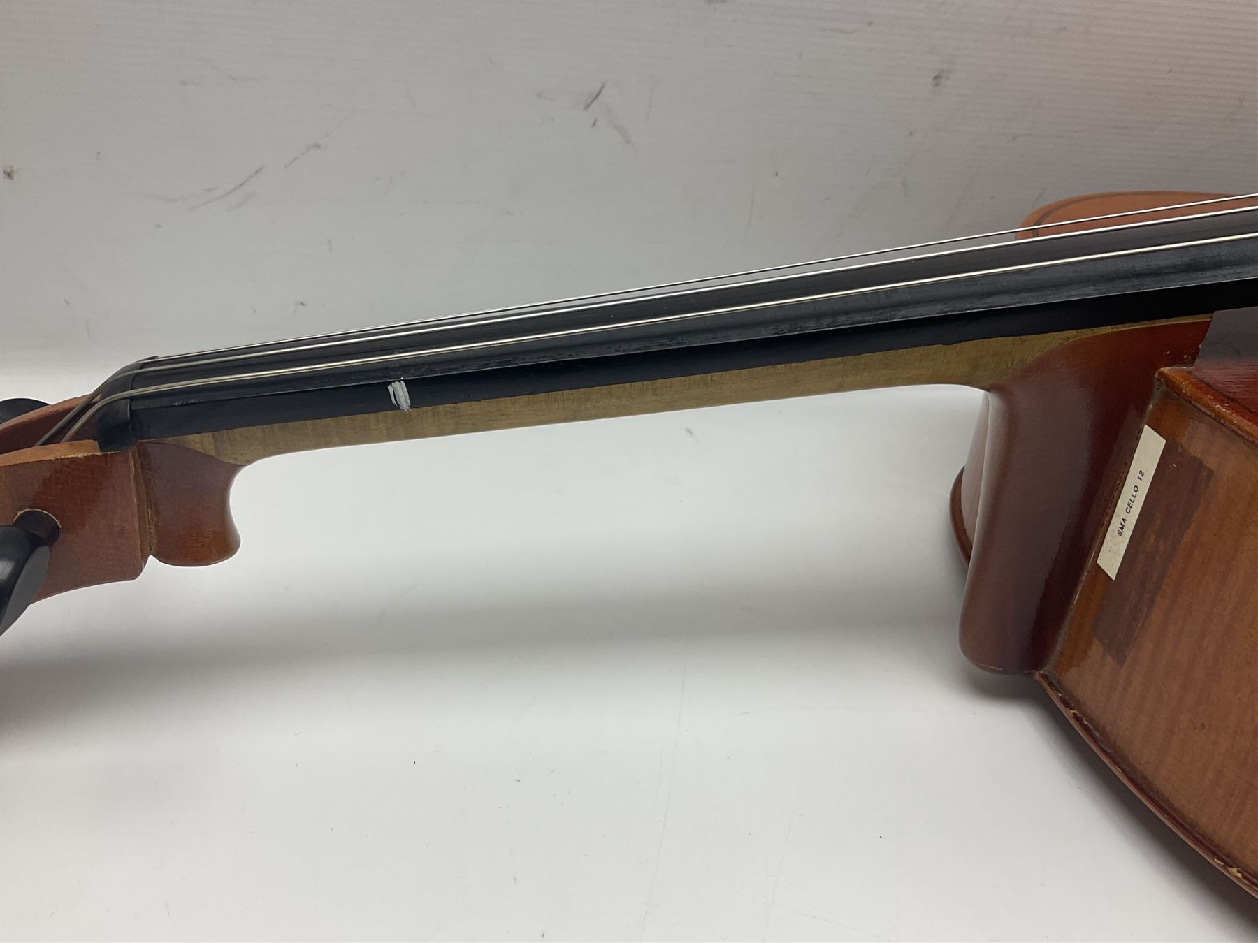 German half-size cello with 69cm two-piece maple back and ribs and spruce top; L112.5cm overall; in soft carrying case with two bows