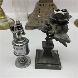 Late 19th century/early 20th century oil lamp, with with glass chimney and Rowatt & Co burner on ornate metal base, together with a pair of brass candlesticks, table lighter, Victorian fob medal and other collectables