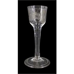 18th century drinking glass of possible Jacobite interest, the ogee bowl engraved with rose and bird in flight, upon a plain stem and folded conical foot, H15cm