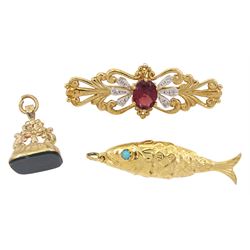 Gold bloodstone fob pendant, Birmingham 1975, gold garnet and diamond brooch and a gold fish pendant, all 9ct