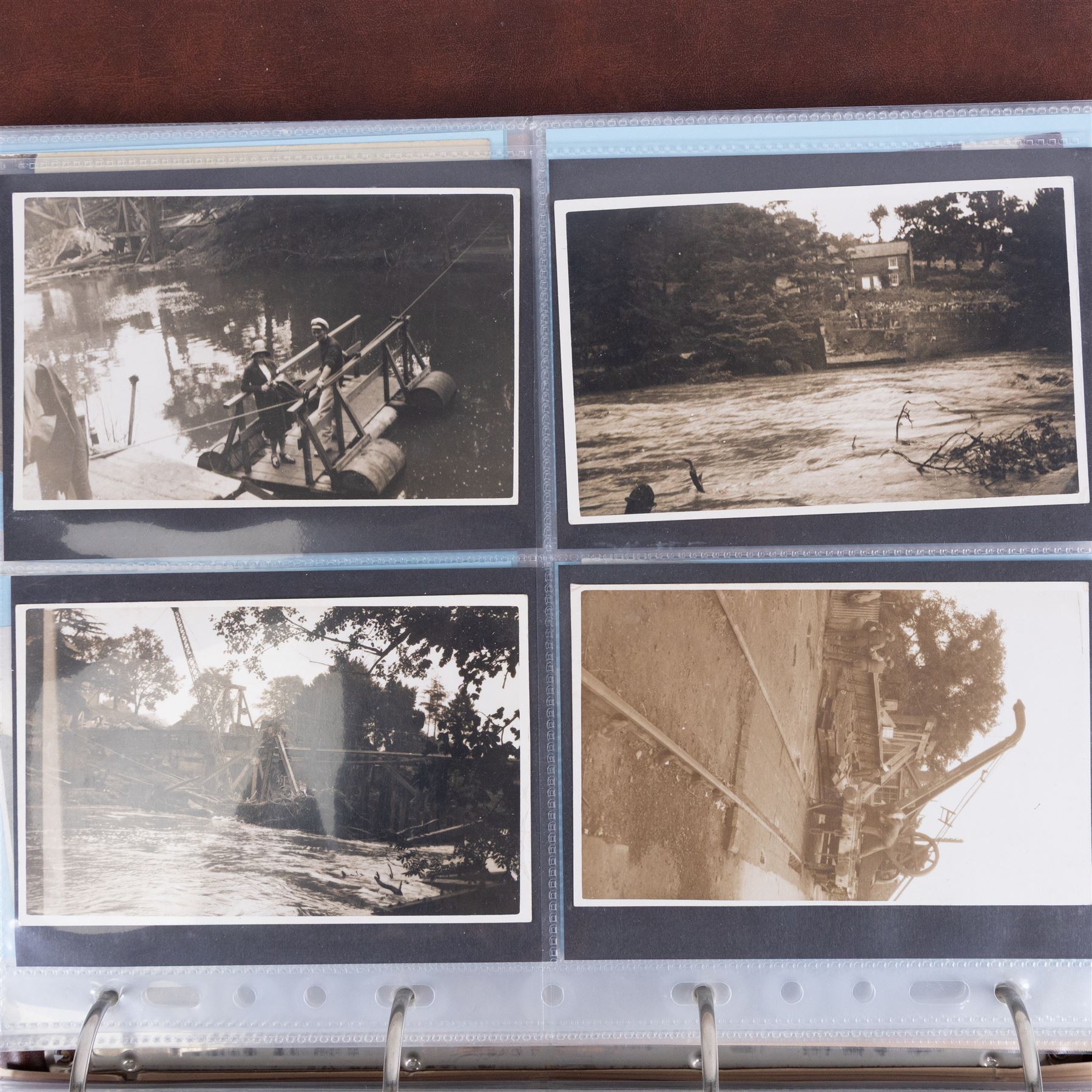 Four-hundred and twelve early 20th century Whitby District view real photographic postcards, including a selection from the Whitby Coast (176), starting at Staithes and Runswick Bay down to Robin Hoods Bay and a selection from the Valley of the River Esk (236), including Ruswarp, Rig Mill, Sneaton, Sleights, Grosmont, Egton, Glaisdale, Danby, Castleton and Goathland, all housed within two postcard albums