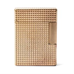 S.T. Dupont - gilt metal pocket lighter, rectangular form with all-over engine-turned diam...