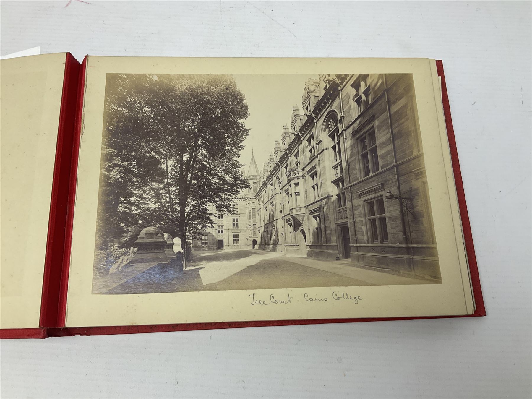 Early 20th century ephemera, to include signed photographs of Charles Boyer and Walter Pidgeon etc, a printed letter from Winston Churchill, two albums and a quantity of transfer books of Players and similar cigarette cards, including Boy Scout and Girl Guide Patrol Signs and Emblems and RAF Badges, a collection of greetings cards and postcards, a photograph album containing black and white photographs of Caius College Cambridge and guides and pamphlets on travelling Switzerland and the UK