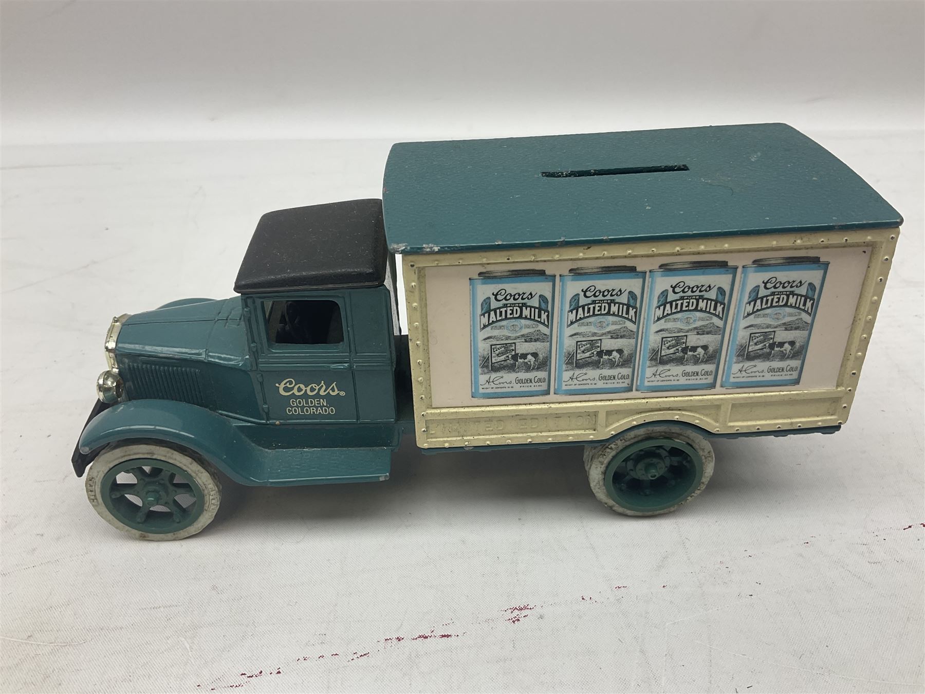 Bugatti cast iron sign with a red background, Shell Oil cast iron sign with gold background, together with Land Rover oil can, motorist warning lamp & torch tool kit and other motoring items 