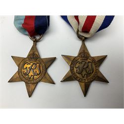 WW1 pair of medals awarded to 151761 Gnr. S. Loten R.A. with ribbons; four WW2 medals with ribbons; and small quantity of cap badges, medallions etc